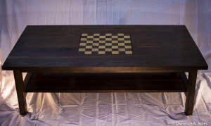 This is a Coffee Table I made for my daughter.  It is made out of Walnut, Maple and Padauk.  This was made with a lot of T.L.C.  I am very proud of this one.  She would now like End Tables. :-))  I already have some ideas.