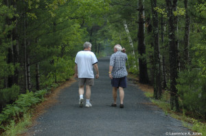 My Dad & Brother BobWalking the Rail Road Trail in Sterling, Massachusetts.Deep in discussion.  That was my Dad's wayNikon D70, 70-300mm f/4.0-5.6 Lens1/40 sec at f/4.0, ISO 200, 70mm
