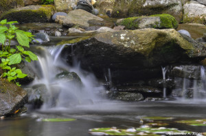 Slowing Down the Force of WaterSterling, MassachusettsThis photo was fun to take.  It was not done with a neutral density filter.  Can you find the old lady?  Look closely....Nikon D90, 18-105mm f/3.5-5.6 Lens8.0 sec at f/32, ISO 200, 105mm